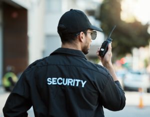 security guard on a walkie talkie